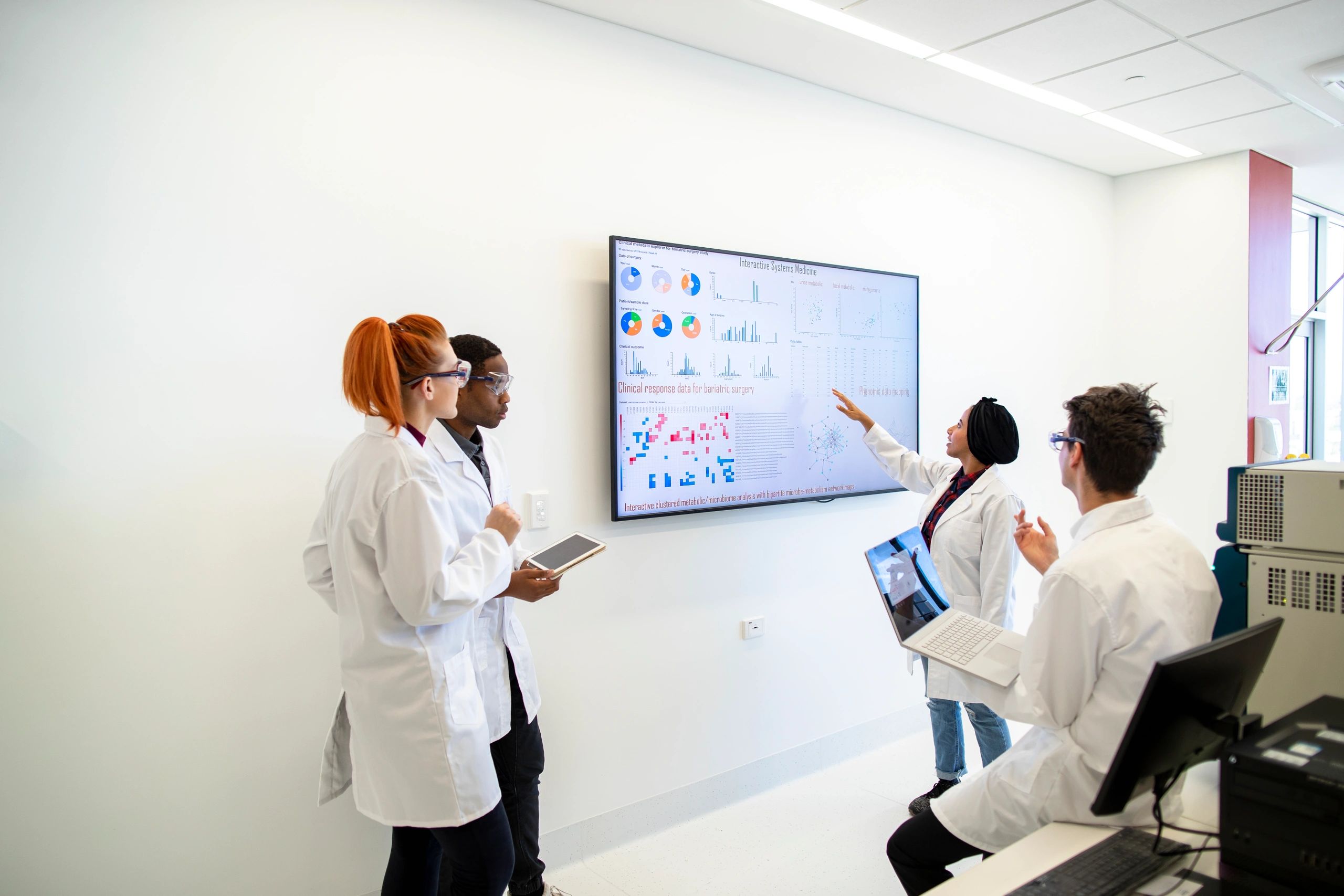 Medical researchers reviewing data in a laboratory