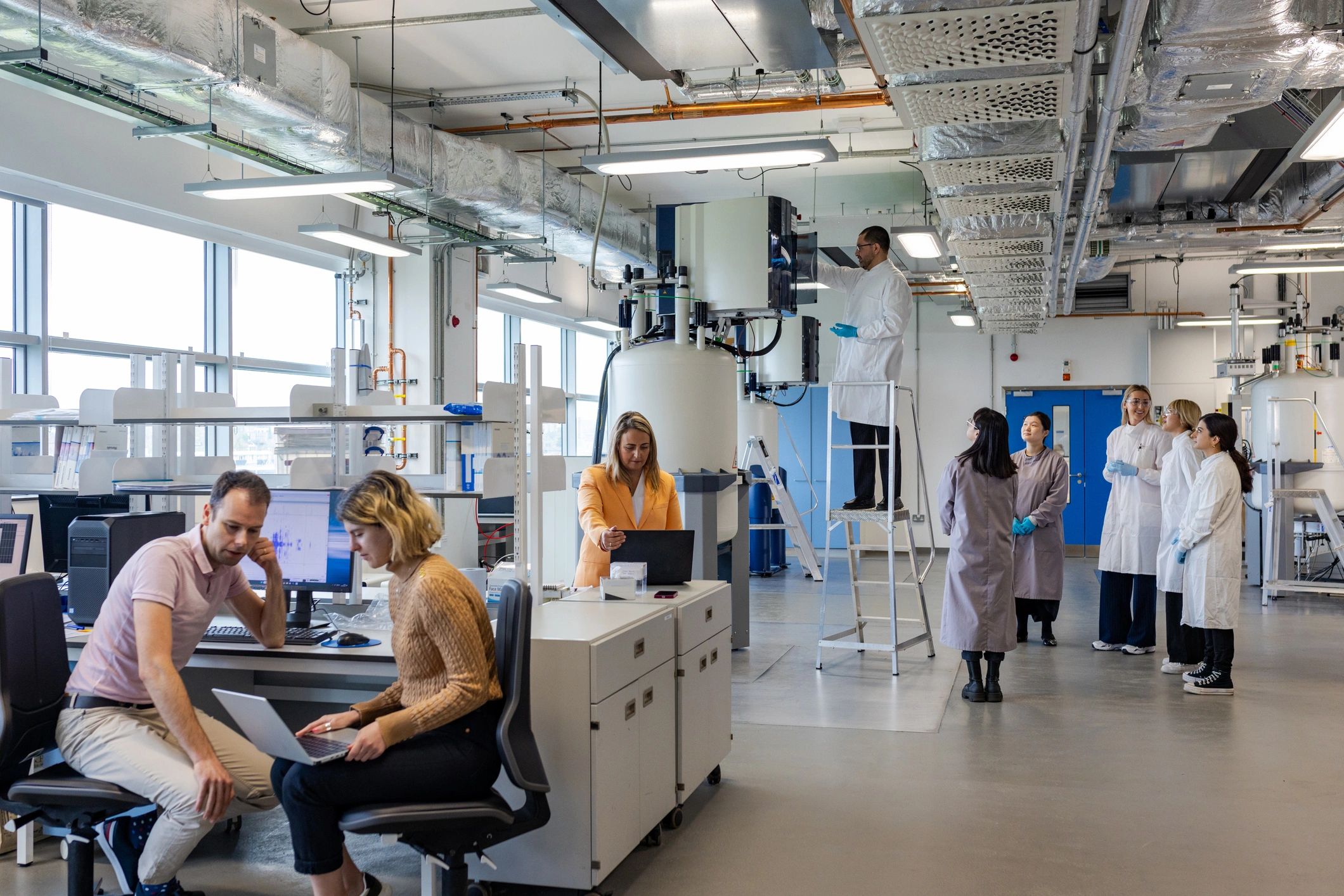 Scientists discussing clinical research results in a laboratory