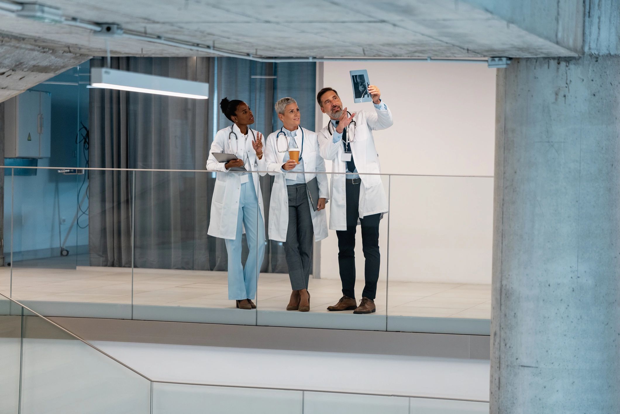 Doctors reviewing medical imaging in a modern hospital